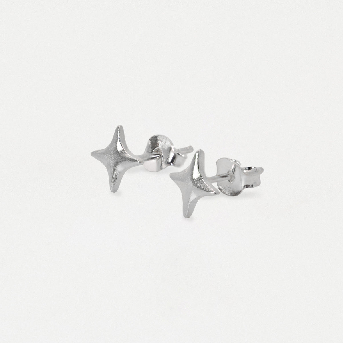 Silver Four-Pointed Starburst Ear Studs