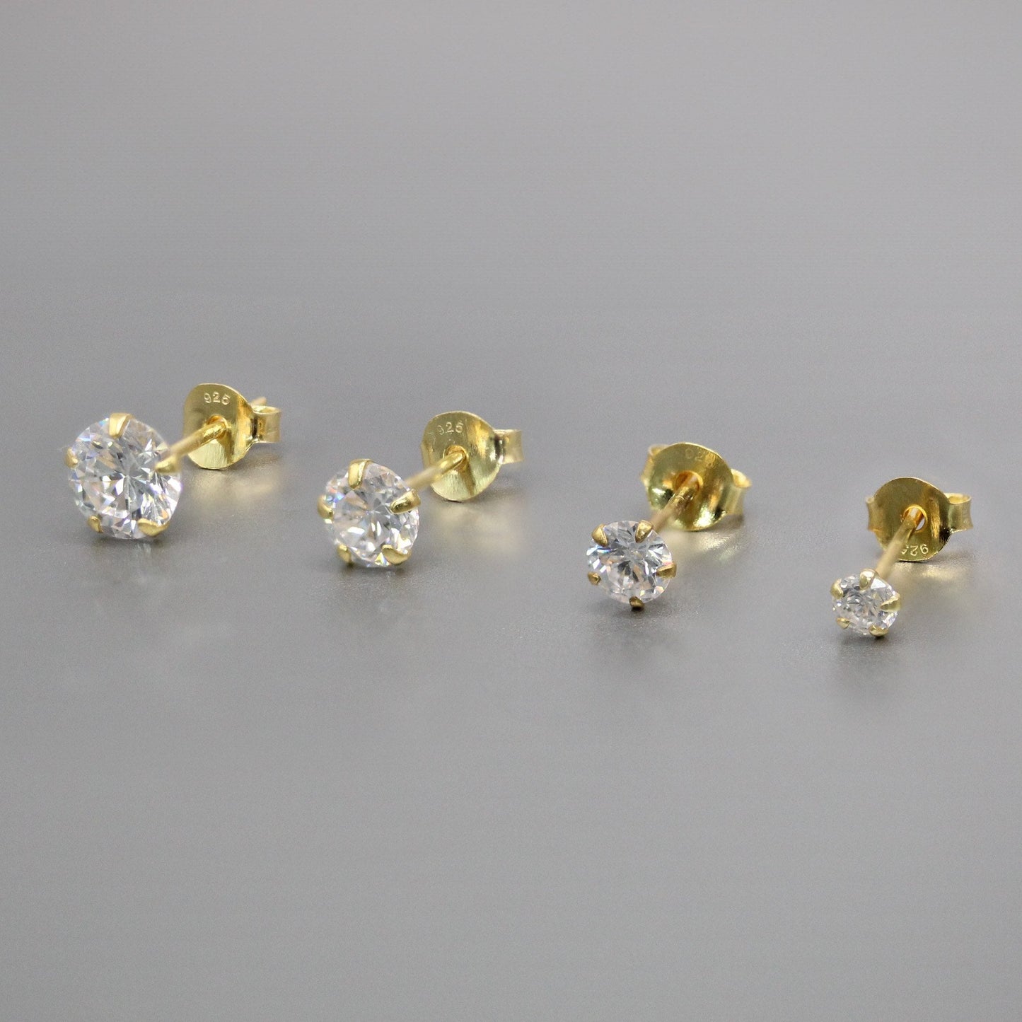 Boxed Gold Round Clear CZ Studs - 4mm