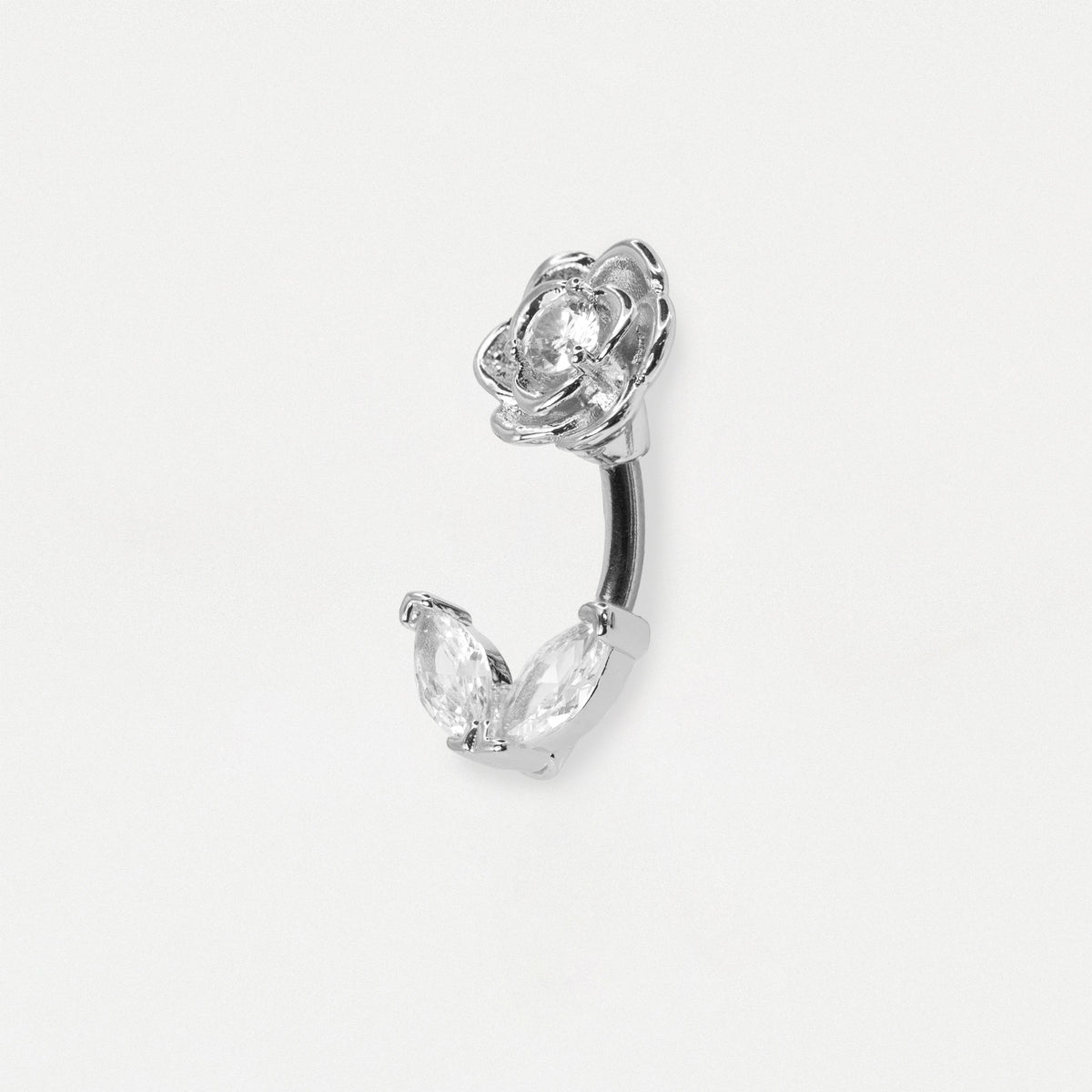 Side image of a Steel floral belly bar with a rose top with a clear crystal center and twin marquise crystal bottom petals by Kingsley Ryan Wholesale