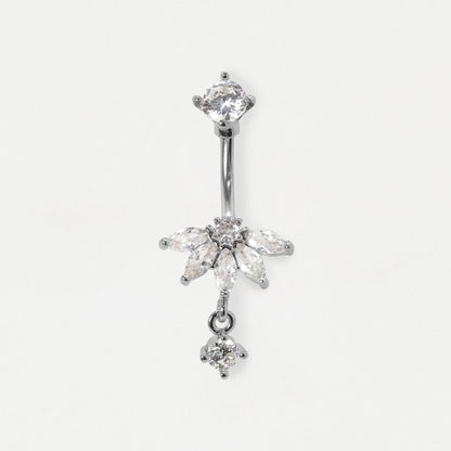 A steel belly button ring featuring a vertical barbell with a clear marquise-cut gemstone cluster and dangling clear stones, shown on a plain light background.