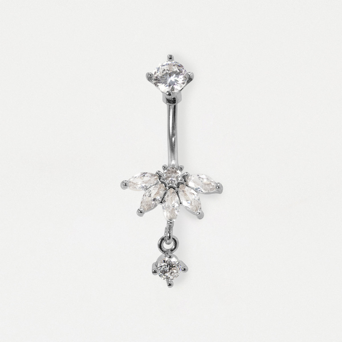 A silver-toned belly button ring featuring a vertical barbell with a clear marquise-cut gemstone cluster and dangling clear stones, shown on a plain light background.