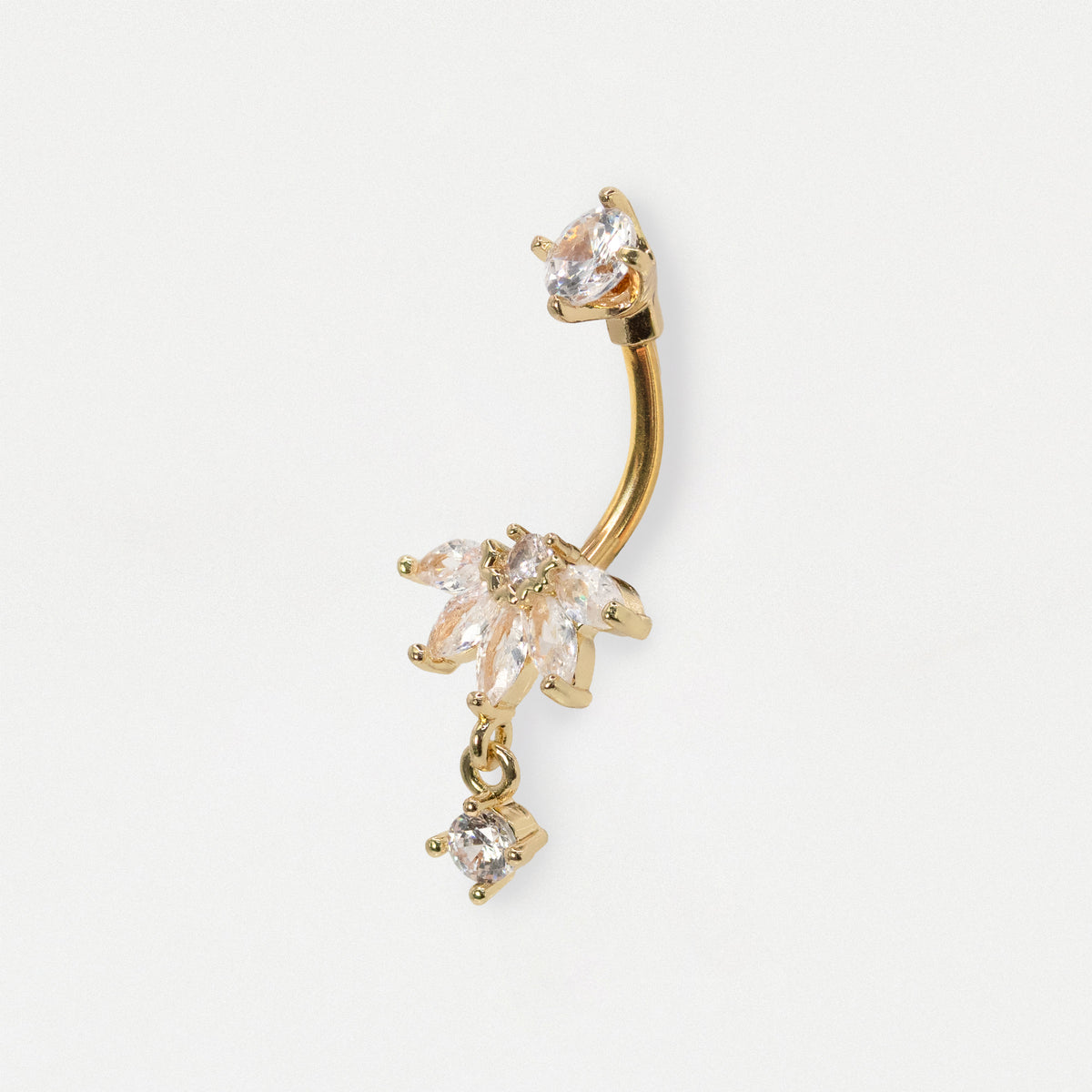 A gold-plated curved barbell belly button piercing adorned with three dangling flower clusters, each embellished with clear marquise-cut rhinestones, set against a plain white background.