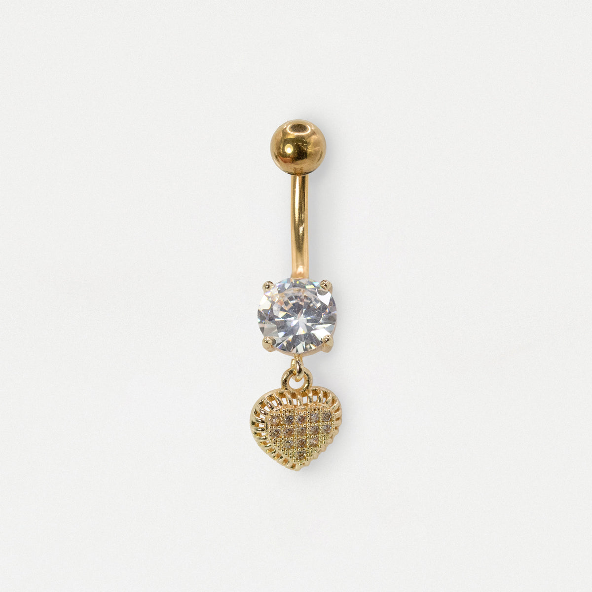 Head on image of a gold steel belly bar with a large claw-set round clear crystal and a dangly heart with clear crystal pavé gemstones by Kingsley Ryan Wholesale