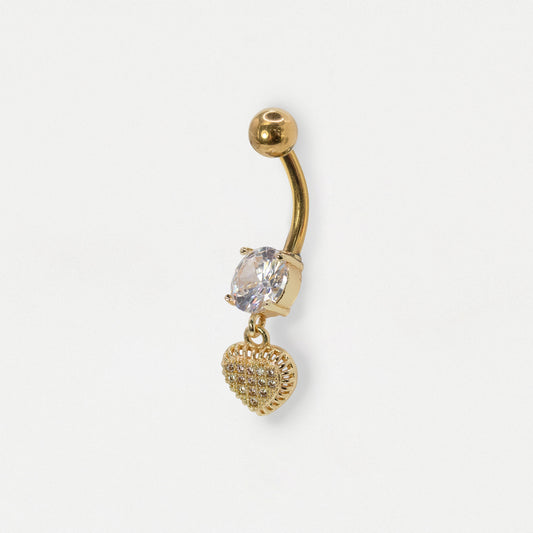 Gold belly bar featuring a large claw-set round clear crystal and a dangling textured heart charm with clear crystal pavé setting by Kingsley Ryan Wholesale