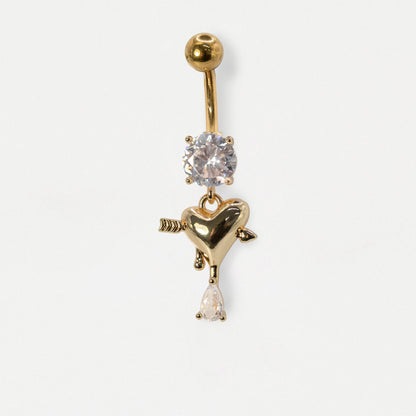 A Gold PVD Steel belly bar with a round clear crystal gemstone and an arrow-pierced heart dangle with a pear crystal drop by Kingsley Ryan Wholesale