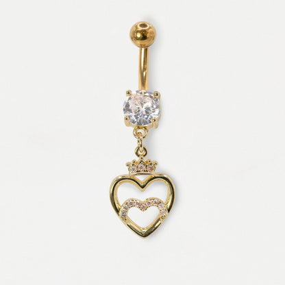 A Gold PVD Steel belly bar with a round clear crystal and an open heart dangle charm topped with a mini crown and clear crystal pavé by Kingsley Ryan Wholesale