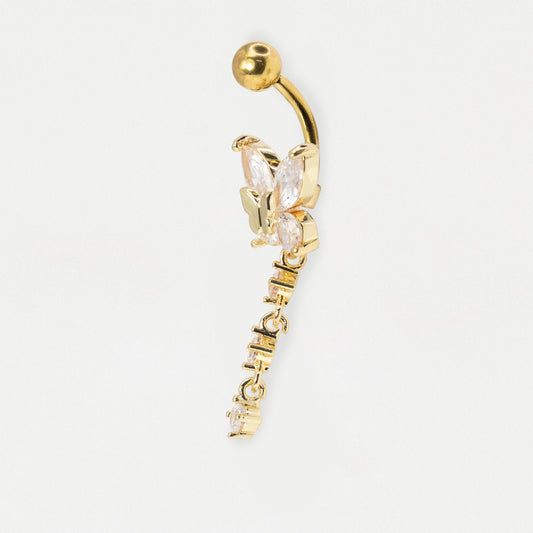 Gold PVD steel belly bar featuring a butterfly design, adorned with clear crystal gemstones and a dangling three-stone crystal line. The jewelry is designed for navel piercings and has a shiny, elegant appearance.