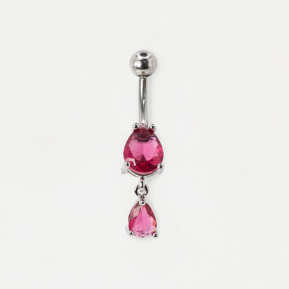 A steel belly button ring featuring two dangling teardrop-shaped pink fuchsia gemstones in a prong setting, shown against a plain white background.