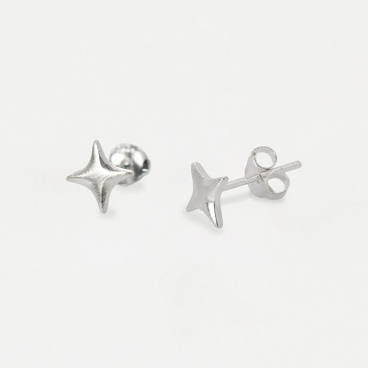 Silver Four-Pointed Starburst Ear Studs