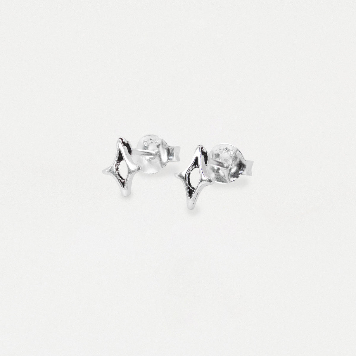 Silver Cutout Four-Point Star Ear Studs