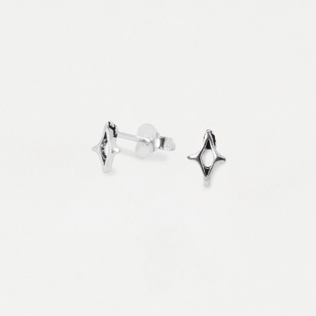 Silver Cutout Four-Point Star Ear Studs
